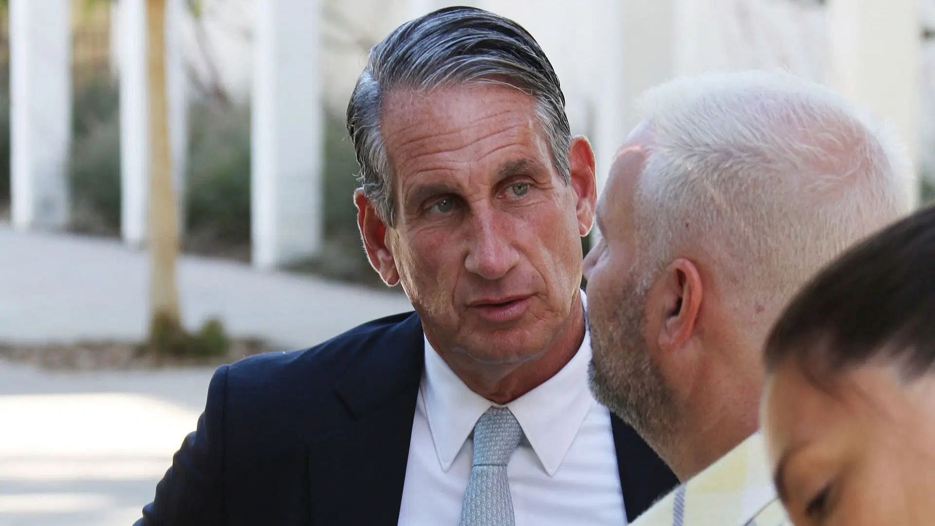 Bryan Freedman standing outside the Menendez Brothers resentencing hearing at Van Nuys Courthouse in Los Angeles, California (Image via Getty)